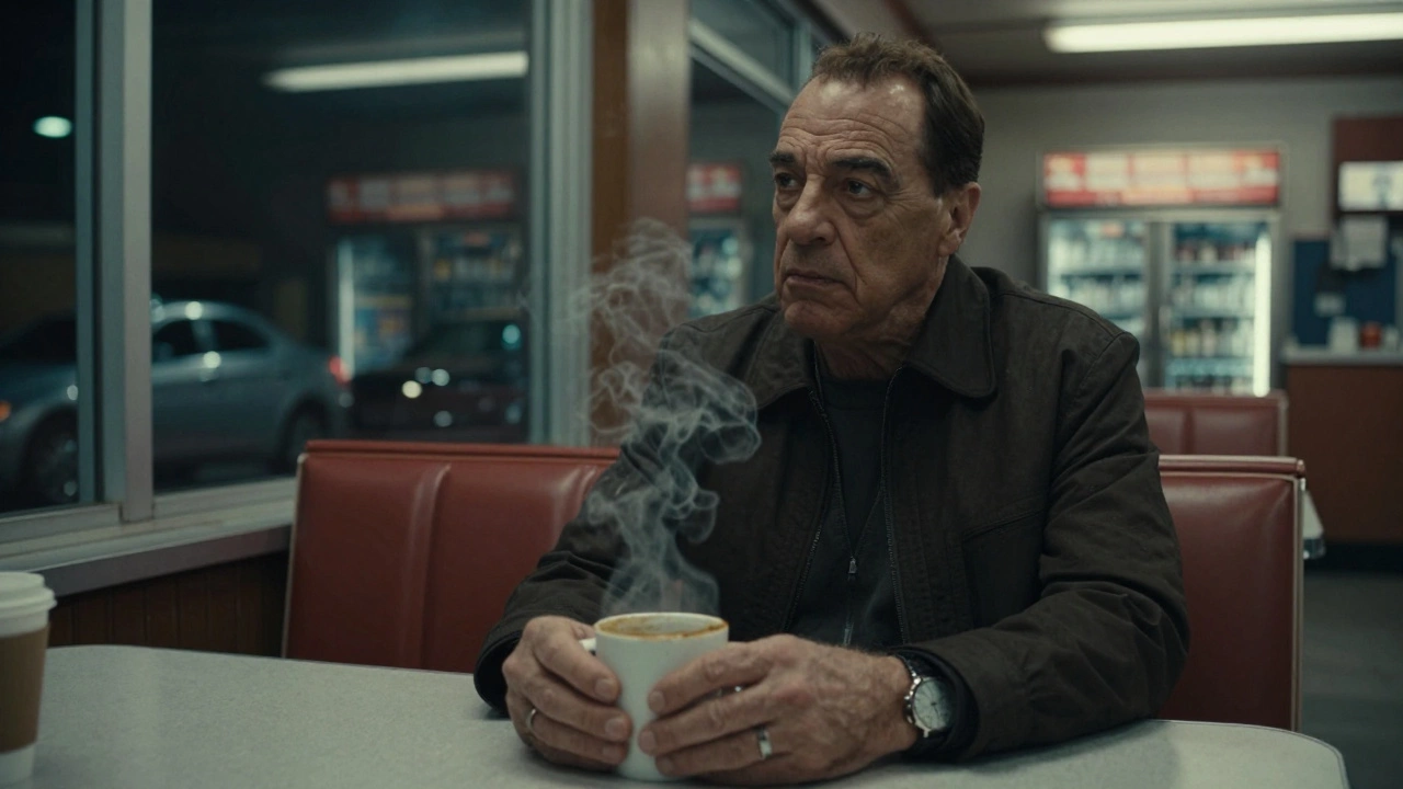 Tony sitting in a quiet diner, staring out the window, coffee steaming beside him, empty booth behind.